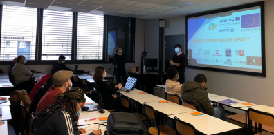 Students in front of a presentation 