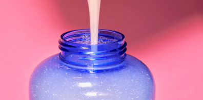 Liquid being poured into a bottle 